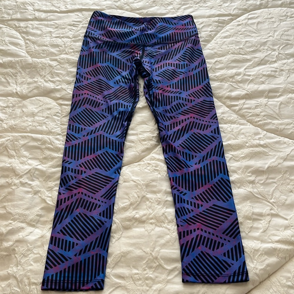 Fun pattern leggings, size small. Purple/pink/blue